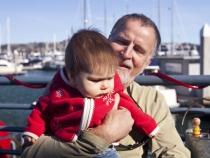 Lilia with Grandpa Greg at Fish