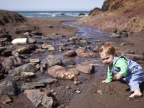 Lilia enjoying the creek at Tennessee Valley Beach