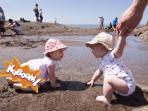 Lilia and Samuel enjoying the sand