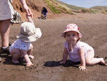 Lilia and Samuel enjoying the sand