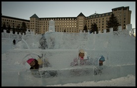 The girls in the ice castle in front of the Fairmont Lake Louise