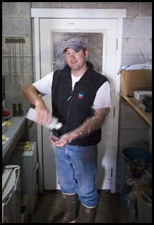 Jarrid lubricates his arm for some bovine lovemaking