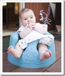 Lilia in her Bumbo seat