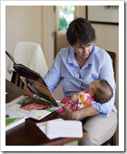 Jenni reading Lilia her first story