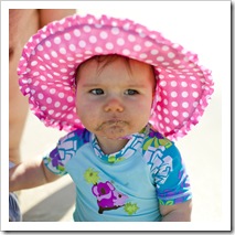 Lilia eating sand at Henley Beach