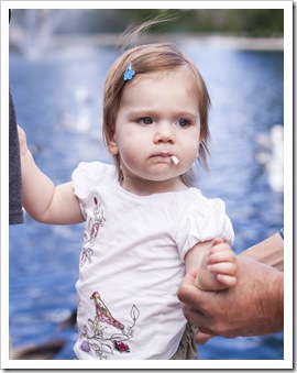 Lilia sneaking some of the bread for the geese!
