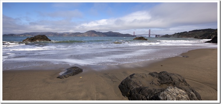 Clearing skies at China Cove with the Golden Gate Bridge in the distance