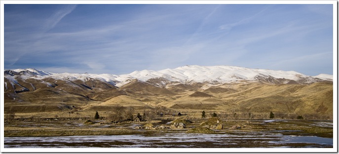 Barren snow-capped hills of the eastern Sierra