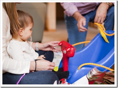 Lilia with her new swing from Grandma and Grandpa