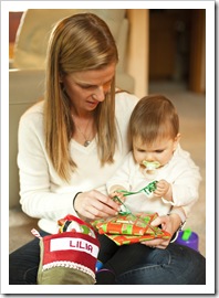 Still enjoying the ribbon more than the presents...