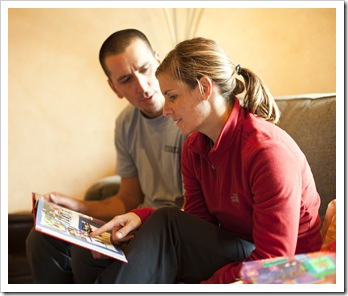 Enjoying the Young family album that Carol put together