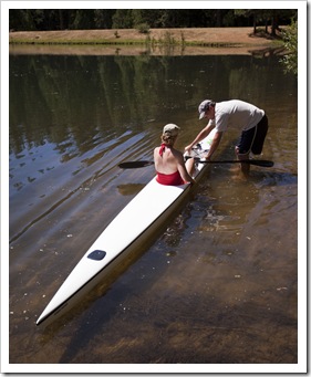 Graham readying Lisa for a paddle on the ski