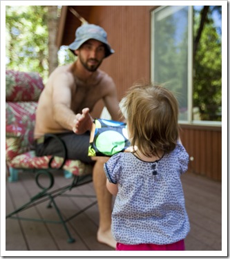 Lilia with a birthday delivery for Dad