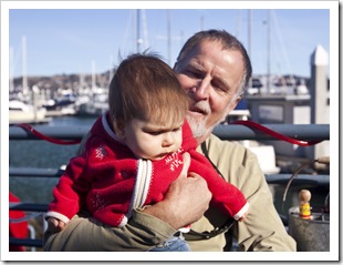 Lilia with Grandpa Greg at Fish