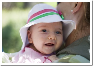 All smiles in her hat from Grandma Jenni