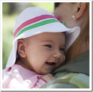 All smiles in her hat from Grandma Jenni
