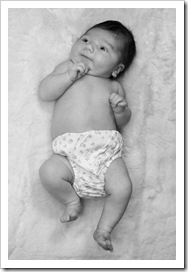 Lilia on Grandma Jenni's sheepskin