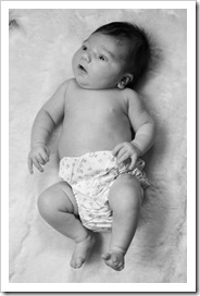 Lilia on Grandma Jenni's sheepskin