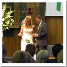 Michele and Jim lighting their candle