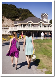 Lisa and Jacque all colors walking into the reception