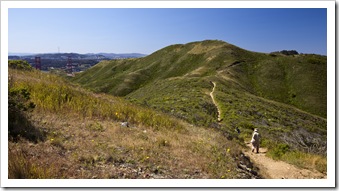 Walking along the trail with the tips of the Golden Gate to the east