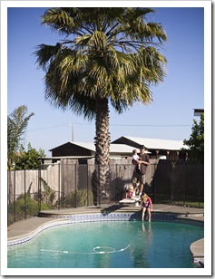 Kevin, Lilia, Sophia and Anna Marie out by the pool