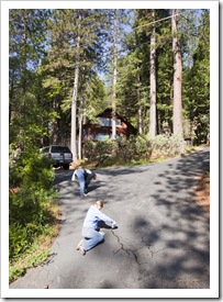 Lisa and Carol patching cracks in the driveway