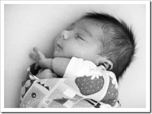 Busted out of one of Dad's swaddles