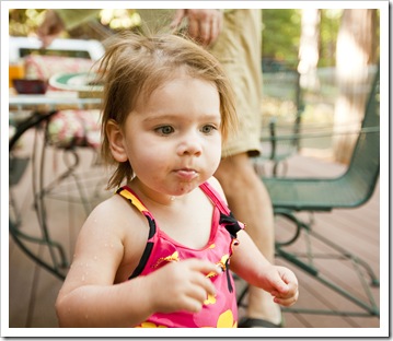 Lilia enjoying her pool on the deck at the cabin