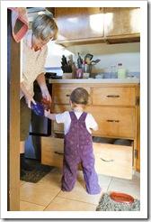 Lilia helping Grandma Carol with the dishes