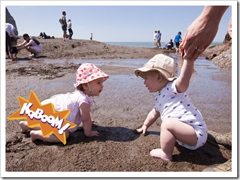 Lilia and Samuel enjoying the sand