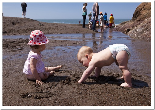 Lilia and Samuel enjoying the sand