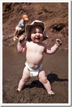 A very happy Samuel showing Lilia how it's done